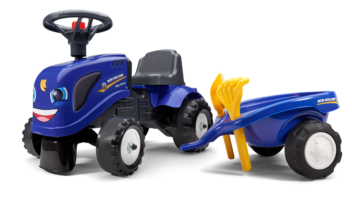 Lauftraktor New Holland mit Anhänger Schaufel und Rechen