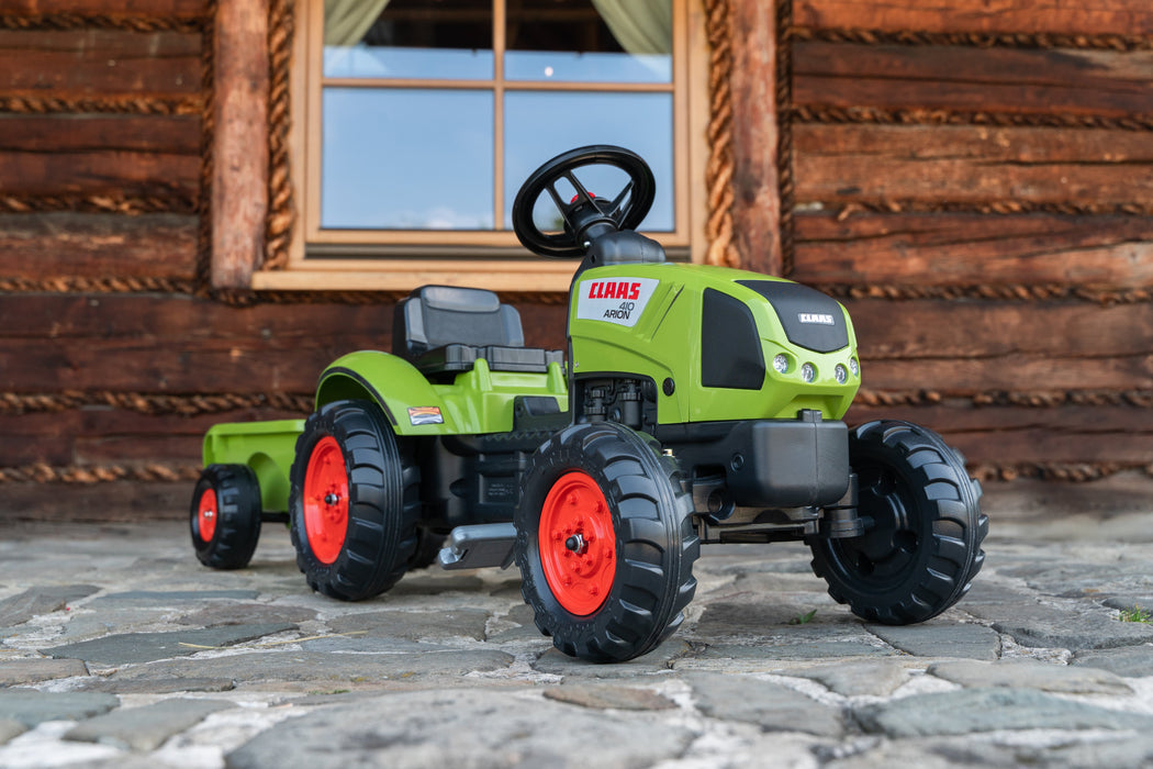 Falk Trettraktor Claas Arion 410 mit Anhänger